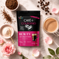 Bolsa de Café + Colágeno y Biotina de Earth Co rodeada de granos de café, colágeno en polvo y flores, con un latte cremoso.